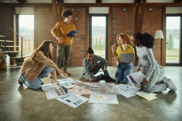 istock Happy creative team working at casual office. 1690227071