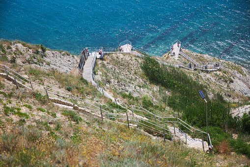 Anapa, Russia - June 16, 2022: High bank of the city. A very long staircase to the sea. More than 800 steps.