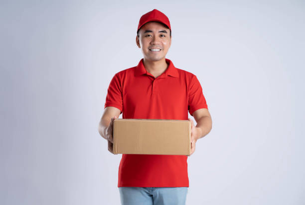 istock image of asian delivery man posing on white background 1690271238