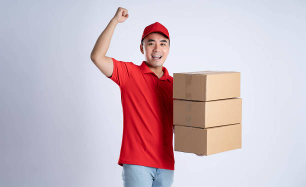 istock image of asian delivery man posing on white background 1690271254
