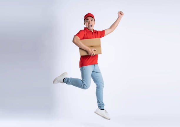 istock image of asian delivery man posing on white background 1690271638