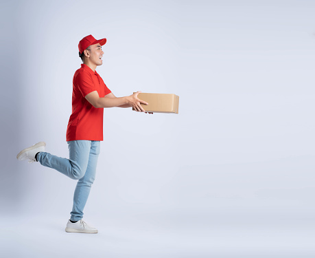 image of asian delivery man posing on white background