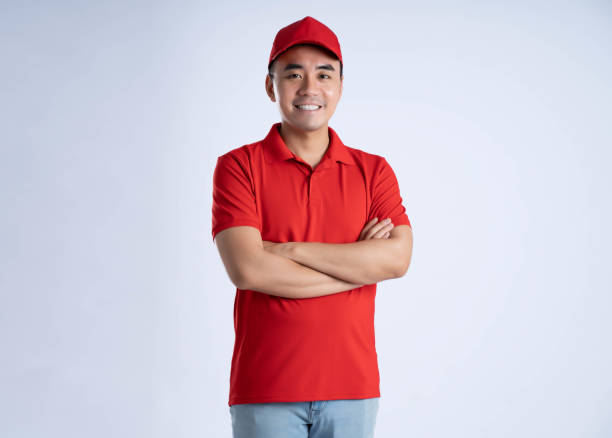 istock image of asian delivery man posing on white background 1690271777