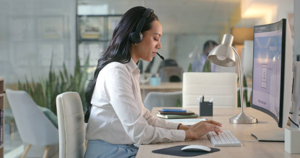 istock Business woman, call center and typing on computer for e commerce, customer service and virtual support in office. Professional agent, consultant or advisor on desktop screen, chat and communication 1690296731