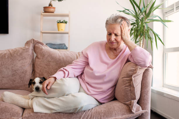 istock middle aged lady looking away sit alone at home feel anxious lonely, sad 1690299463