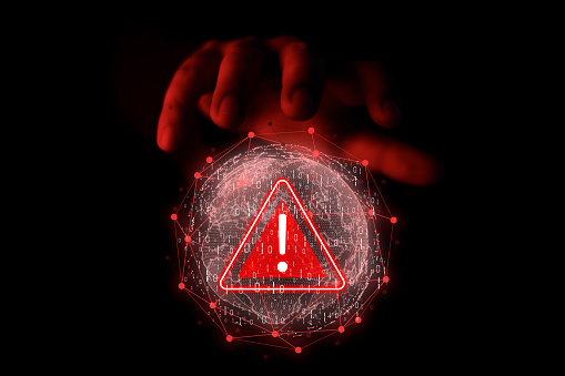 Hand touching globe icon warning abnormality due to hacker attack. Cyber Anomaly Notice. Maintenance concept of hacker attack and hacking, cyber attack, cyber security.