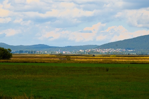 View of Cerknica town and dry Cerknica lakebed in Notranjska, Slovenia