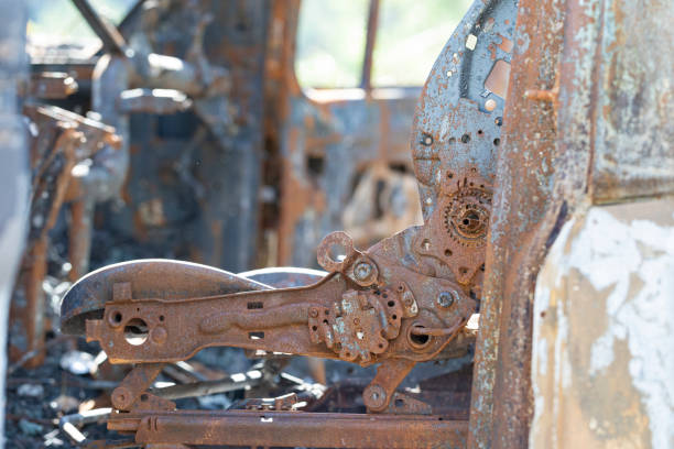 istock Burnt truck details, rusty and melted pieces. 1690347992
