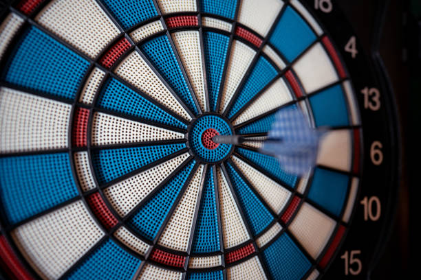 istock Dart hitting the center bull's eye 1690357095