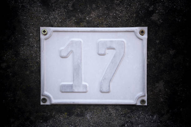 Metal plate showing house number 17