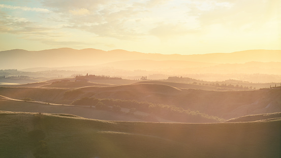 Beautiful view of Tuscany at sunrise. Crete Senesi, Siena Province, Italy