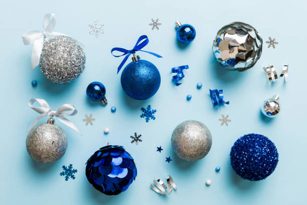 istock Christmas ball on colored background. decoration bauble with ribbon bow with copy space 1690408645