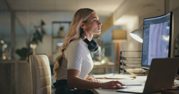 istock Woman, graphic designer and computer screen for online illustration, sketch and creative planning in night office. Young artist in marketing agency with design ideas, development and tech software 1690409801