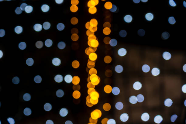 istock Abstract bokeh with blue and yellow lights background illustration 1690426350