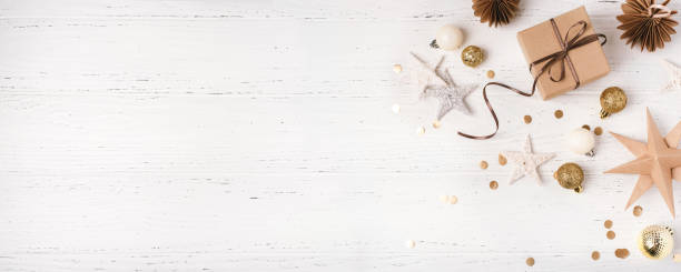 istock Festive Christmas background with gift box and Christmas decorations 1690427905