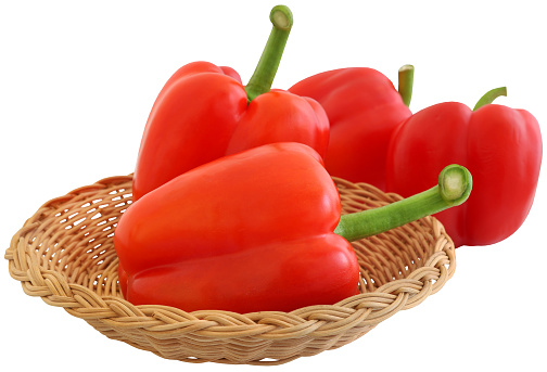 Red capsicum fresh and organic in a basket
