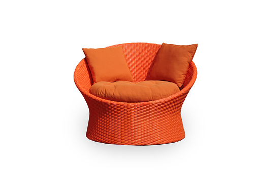 Orange rattan sofa with pillows isolated on white background