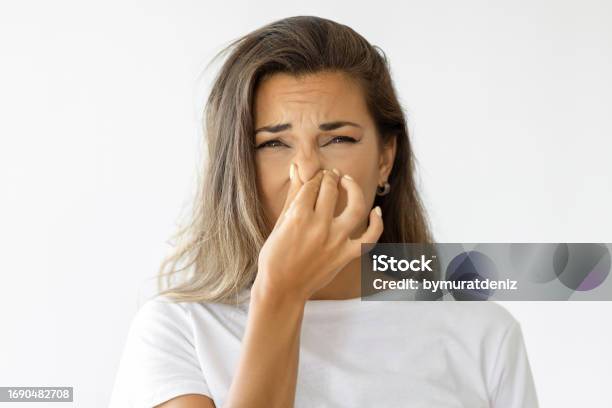 Representing Bad Smell And Disgust Stock Photo - Download Image Now - Nose, Unpleasant Smell, Women