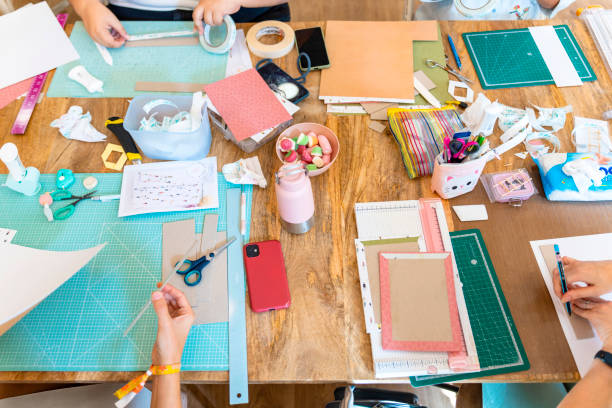 istock Scrapbook workshop. Top view of the scrap work table 1690493524