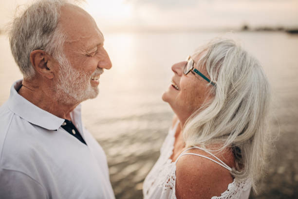 istock Happy senior couple by the sea 1690494079
