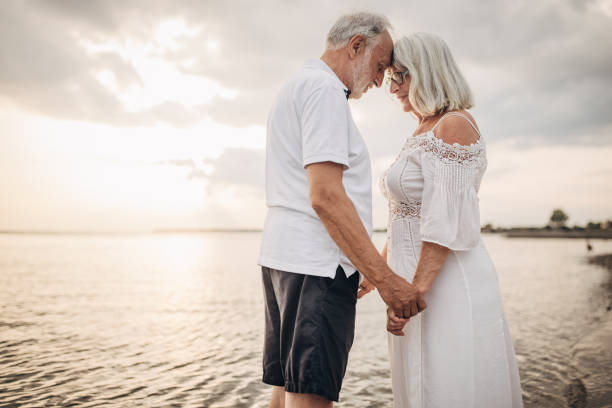 istock Happy old couple by the sea 1690495720