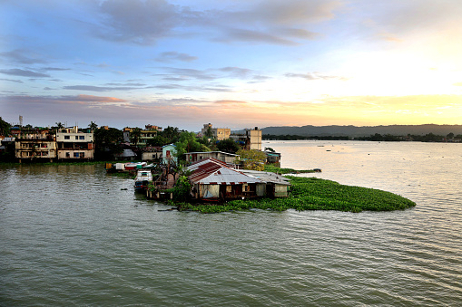 Many houses near the Kaptai Lake in the Rangamati hill district of Bangladesh are being submerged in the water from the hills coming down from the upstream.
