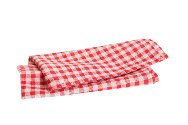 istock Red textile napkin isolated on white background. Folded decorative kitchen cotton towel. Top view 1690598292