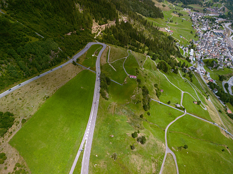 Country road in the Alps, Road in the alpine landscape, Aerial view of a mountain highway