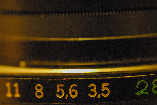 An image the the f/stop ring of an old camera lens