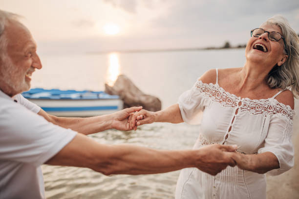 istock Happy couple by the sea 1690728739