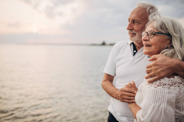 istock Happy couple by the sea 1690731420