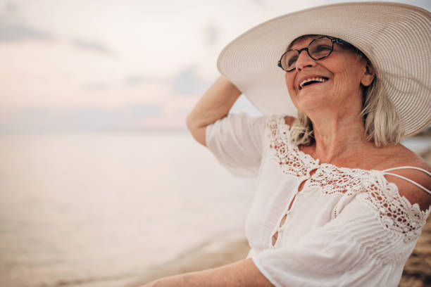 istock Charming old woman by the sea 1690739643