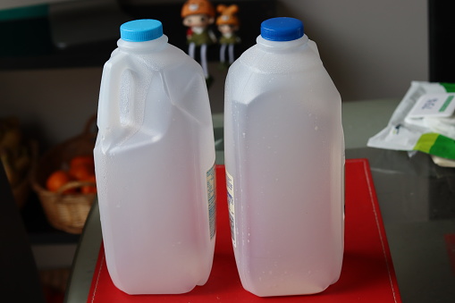 Most households can clean out empty plastic milk bottles and put them in their domestic recycling bins for collection and recycling by the local authority.