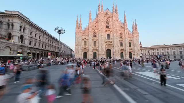 Motion Timelapse View of People at the Historic Piazza del Duomo Square at Sunset in Milan, Italy