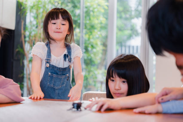 istock Family observing insects at home 1690806138