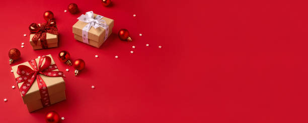 istock Christmas gift boxes with red balls. 1690812756