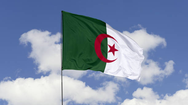 istock Algeria Flag is Waving Against in the Sky. 1690833133