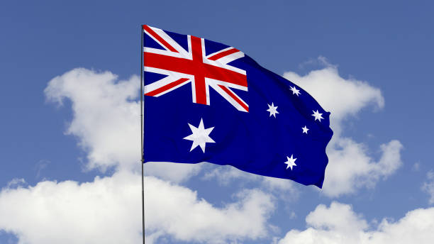 istock Australian Flag is Waving Against in the Sky. 1690833680