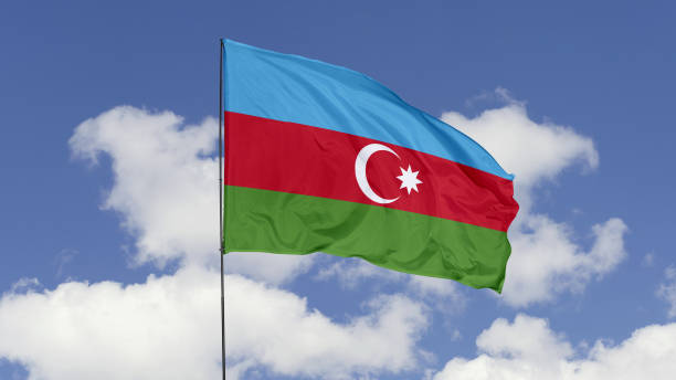 istock Azerbaijan Flag is Waving Against in the Sky. 1690833703