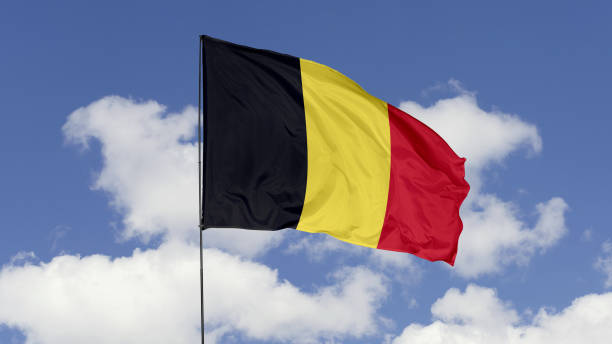 istock Belgium Flag is Waving Against in the Sky. 1690834047