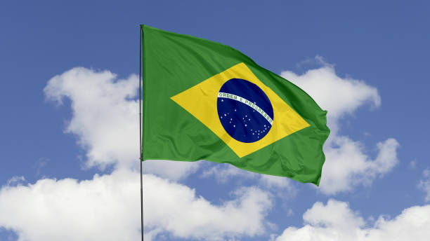 istock Brazil Flag is Waving Against in the Sky. 1690834297