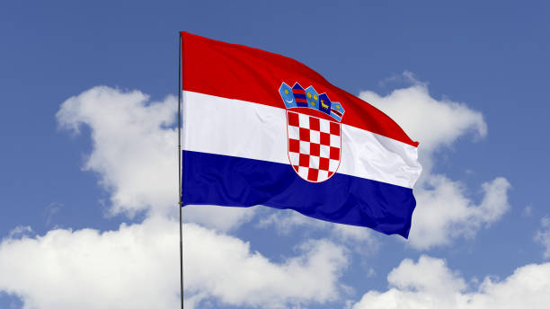 istock Croatia Flag is Waving Against in the Sky. 1690835016