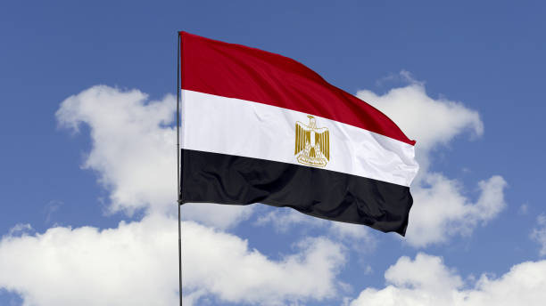 istock Egypt Flag is Waving Against in the Sky. 1690835983