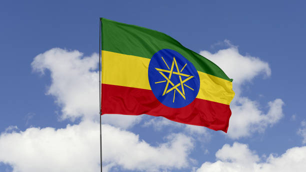 istock Ethiopia Flag is Waving Against in the Sky. 1690835999