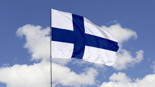 istock Finland Flag is Waving Against in the Sky. 1690836516