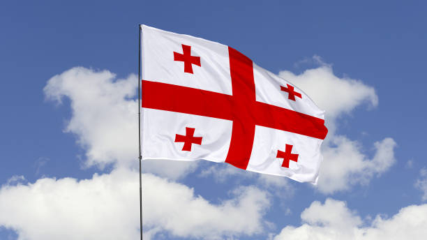 Georgia Flag is Waving Against in the Sky. 3d illustration flag of Georgia. Georgia flag isolated on the blue sky. georgia flag country stock pictures, royalty-free photos & images