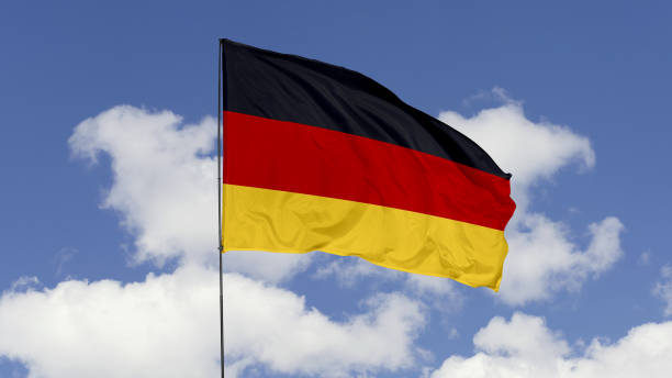 istock Germany Flag is Waving Against in the Sky. 1690836522
