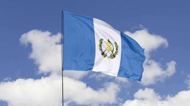 istock Guatemala Flag is Waving Against in the Sky. 1690836540