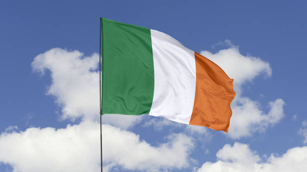 istock Ireland Flag is Waving Against in the Sky. 1690837077