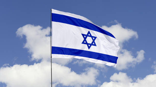 istock Israel Flag is Waving Against in the Sky. 1690837587